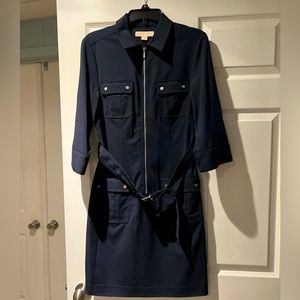 Michael Kors knee-length dress. Belted. Navy blue with silver accents.